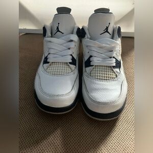 White and Navy Jordan 4’s